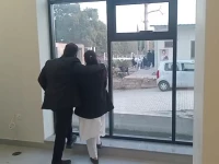 lawyer duo imaan mazari and hadi ali chattha overlooking the islamabad police stationed outside islamabad high court bar president s office waiting to arrest the couple photo express