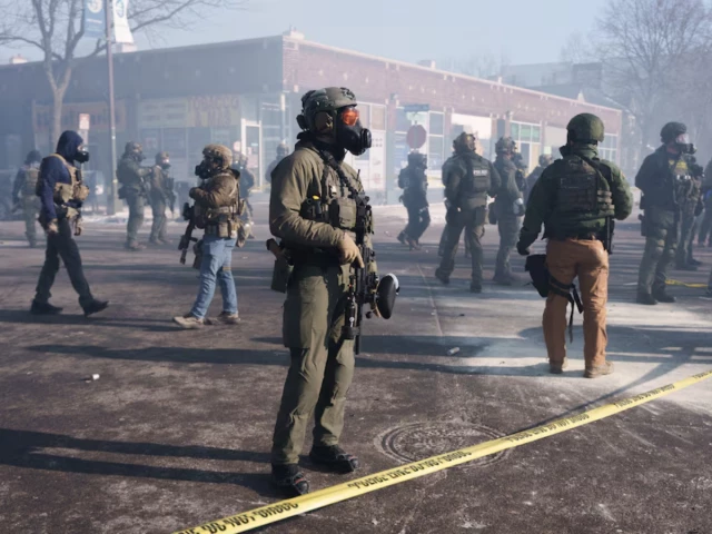 federal agents stand amid teargas near the site where a man identified as alex pretti was fatally shot by federal agents trying to detain him in minneapolis minnesota us january 24 2026 photo reuters federal agents stand amid teargas near the site where a man identified as alex pretti was fatally shot by federal agents trying to detain him in minneapolis minnesota us january 24 2026 photo reuters