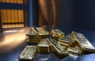 gold bars of various values are stored in a safe deposit room in munich germany january 28 2026 photo reuters