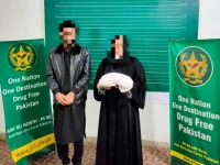 suspects arrested in a joint pakistan qatar operation when attempting to smuggle 4 48 kilogrammes of cocaine at islamabad international airport photo express