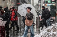people walk on a street as snow falls during a winter storm in new york city us february 22 photo reuters