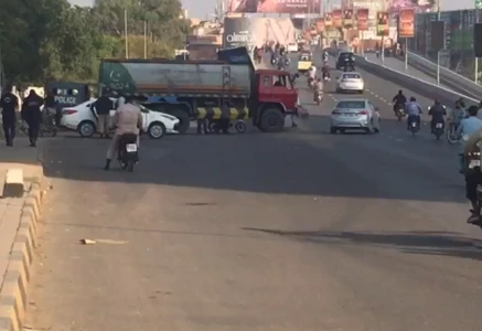 life in karachi continued as normal on monday a day after at least 10 protesters were killed in clashes outside the us consulate photo express