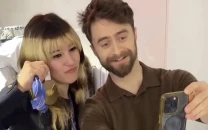 alysa liu and daniel radcliffe share playful gold medal moment backstage at today
