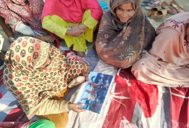community awareness session with women to discuss possible factors for illegal trade of snow leopard photo express