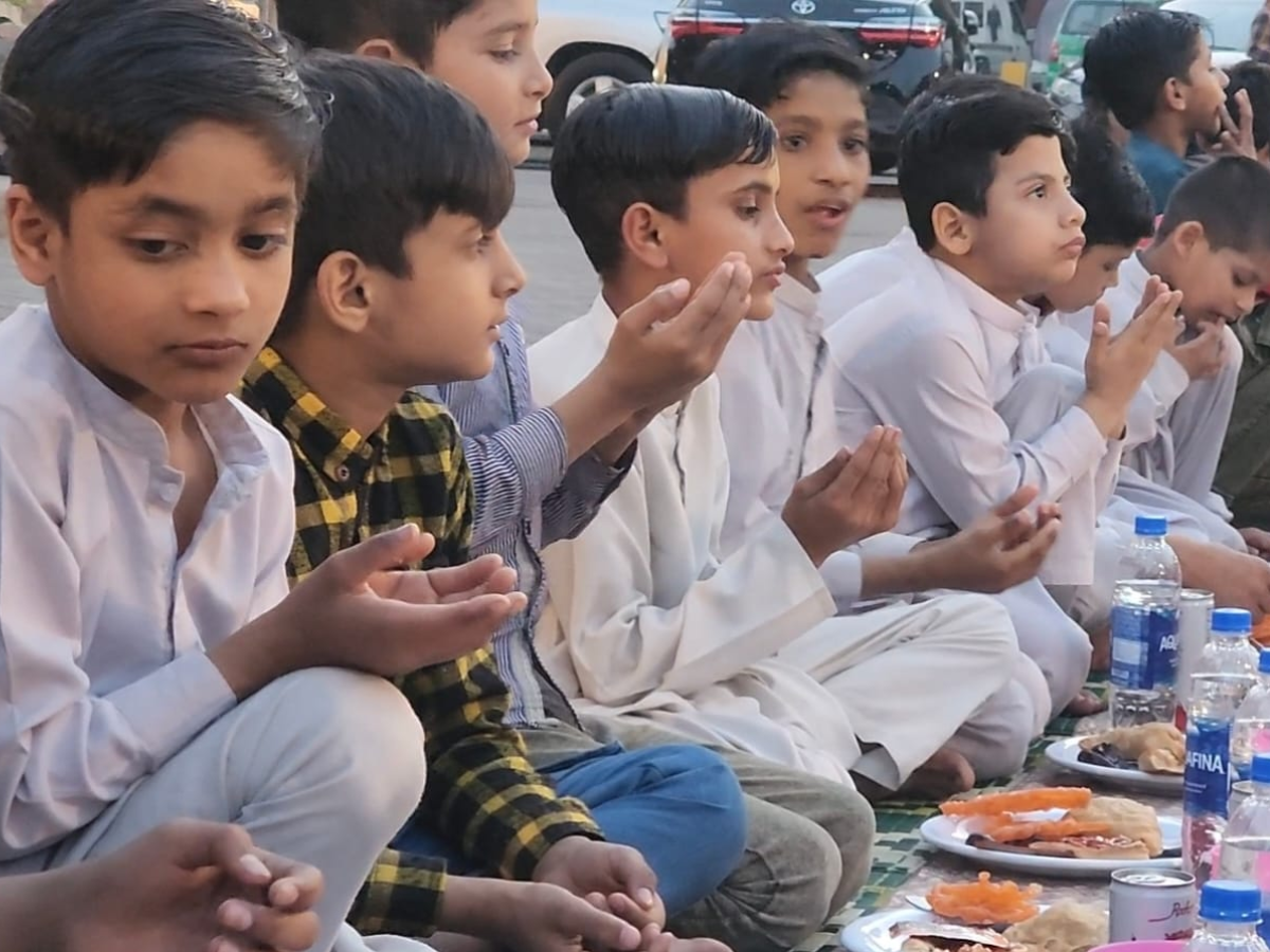 Children residing at Lahore’s Child Protection and Welfare Bureau (CPWB) enjoy a special iftar during Ramazan PHOTO: EXPRESS
