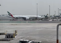 an emirates airplane at dubai international airport amid the u s  israeli conflict with iran in dubai united arab emirates march 8 2026 picture taken by phone photo reuters