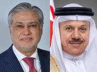 pictured on the left foreign minister ishaq dar on the right bahrain s foreign minister abdullatif bin rashid al zayani photo mofa bahrain fo
