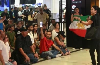 supporters of the iranian women s soccer team gather at sydney airport after five of the players were granted asylum in sydney australia march 10 2026 photo reuters