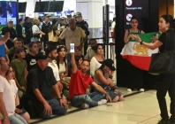 supporters of the iranian women s soccer team gather at sydney airport after five of the players were granted asylum in sydney australia march 10 2026 photo reuters