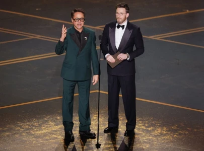 robert downey jr chris evans reunite at oscars ahead of avengers doomsday