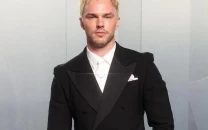 nicholas hoult returns to bleached blond hair steps out with wife bryana holly at vanity fair oscar party nicholas hoult returns to bleached blond hair steps out with wife bryana holly at vanity fair oscar party