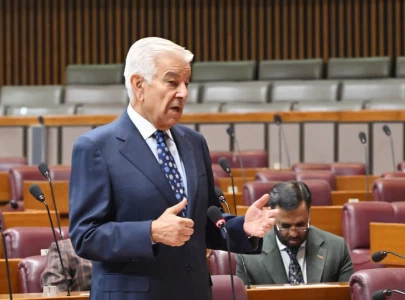 khawaja asif defends solar policy amid criticism over taxes power costs in na