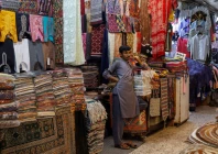 a shopkeeper stands outside his shop while waiting for customers ahead of eid al fitr celebrations in karachi pakistan april 19 2023 photo reuters a shopkeeper stands outside his shop while waiting for customers ahead of eid al fitr celebrations in karachi pakistan april 19 2023 photo reuters