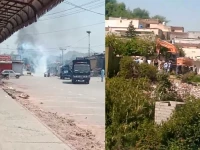 an anti encroachment operation by the capital development authority cda in islamabad triggered strong reactions from protesters who set two official vehicles on fire april 14 2026 photo express