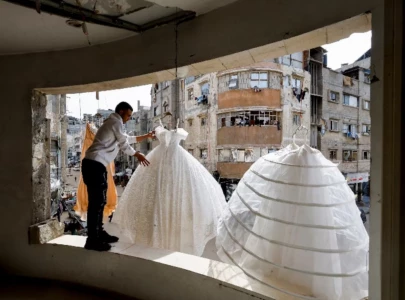 in war scarred gaza brides turn to refurbished wedding dresses in war scarred gaza brides turn to refurbished wedding dresses