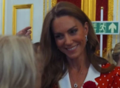 kate middleton s shoes steal the spotlight during appearance with king charles