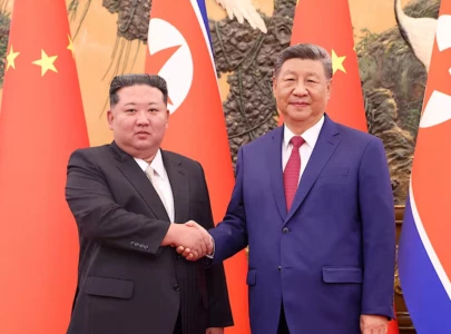 with china s xi in north korea kim to project confidence defiance with china s xi in north korea kim to project confidence defiance