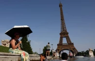 people cool off in the trocadero fountain in front of the eiffel tower as temperatures rise in paris during a heatwave affecting a large part of france june 23 2026 photo reuters