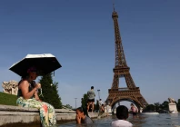 people cool off in the trocadero fountain in front of the eiffel tower as temperatures rise in paris during a heatwave affecting a large part of france june 23 2026 photo reuters