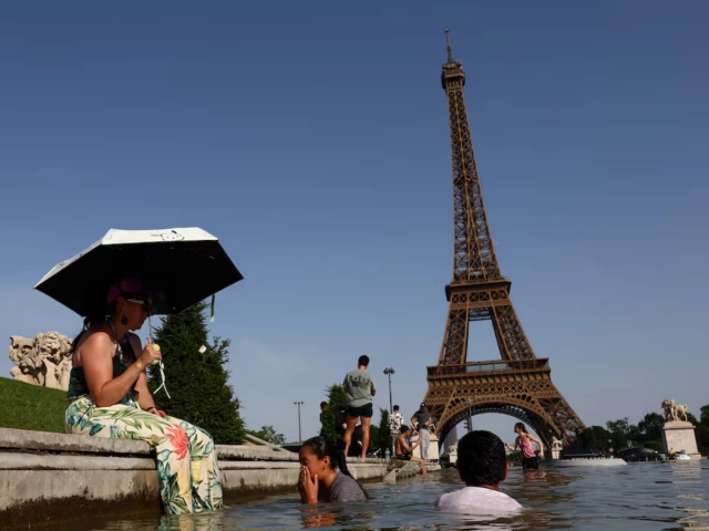 people cool off in the trocadero fountain in front of the eiffel tower as temperatures rise in paris during a heatwave affecting a large part of france june 23 2026 photo reuters people cool off in the trocadero fountain in front of the eiffel tower as temperatures rise in paris during a heatwave affecting a large part of france june 23 2026 photo reuters