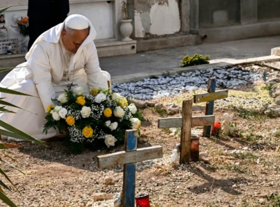 pope urges europe to protect migrants in visit to island frontier