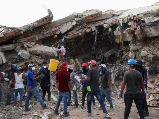 rescuers search through debris in the aftermath of the june 24 earthquakes in la guaira venezuela july 4 2026 photo reuters rescuers search through debris in the aftermath of the june 24 earthquakes in la guaira venezuela july 4 2026 photo reuters
