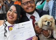 diana tupiza and andres alquinga pose with their dog luna who served as a witness at their civil wedding photo afp diana tupiza and andres alquinga pose with their dog luna who served as a witness at their civil wedding photo afp