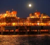 the full moon rises in the background over the infrastructure on d island the main processing hub at the kashagan offshore oil field in the caspian sea in western kazakhstan august 21 2013 photo reuters