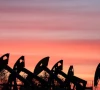 sunset clouds glow over pump jacks at the airankol oil field operated by caspiy neft in the atyrau region kazakhstan april 21 2026 photo reuters