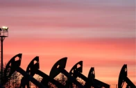 sunset clouds glow over pump jacks at the airankol oil field operated by caspiy neft in the atyrau region kazakhstan april 21 2026 photo reuters