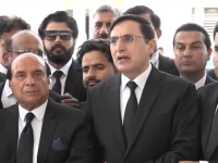 barrister gohar ali khan alongside latif khosa speaking to the media outside the supreme court screengrab