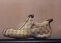 drip sneaker model by gucci is displayed in a gucci store in paris france photo reuters