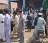 people gather after unidentifed men opened fire on traffic police officers in wazirabad tank district photo express people gather after unidentifed men opened fire on traffic police officers in wazirabad tank district photo express