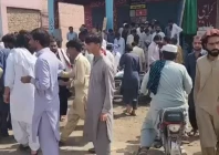people gather after unidentifed men opened fire on traffic police officers in wazirabad tank district photo express