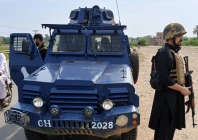 police personnel stand guard in bannu following an operation in which wanted commander zainullah alias salar was killed on saturday photo express