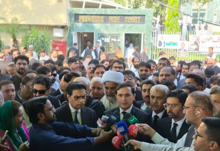 pti leaders speak to the media outside the peshawar high court phc on tuesday photo goharalikhan x