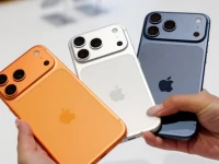 a person holds apple s new iphone 17 series at an apple store in taipei taiwan september 19 2025 photo reuters