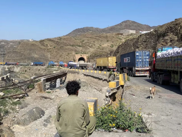 a man sits next to trucks parked at the torkham border crossing after pakistan closed border crossings with afghanistan following exchanges of fire between the forces of the two countries in torkham pakistan october 12 2025 photo reuters a man sits next to trucks parked at the torkham border crossing after pakistan closed border crossings with afghanistan following exchanges of fire between the forces of the two countries in torkham pakistan october 12 2025 photo reuters