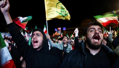 people shout slogans as they gather after a two week ceasefire in the iran war was announced in tehran iran april 8 2026 photo reuters
