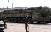 pentagon chief sounds alarm over china s buildup urges allies to boost defence spend