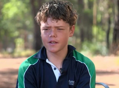 australian teen hero swims miles through rough seas to save family