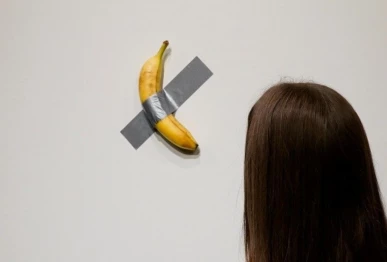 screengrab of italian visual artist maurizio cattelan s conceptual work comedian afp