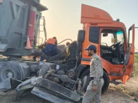 a speeding trailer crushed a police mobile van deployed for checking near chakwal pump on super highway resulting in the deaths of a sub inspector and a constable photo express