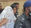 anmol alias pinky being escorted to the judicial complex for her hearing under a white garb on monday photo express