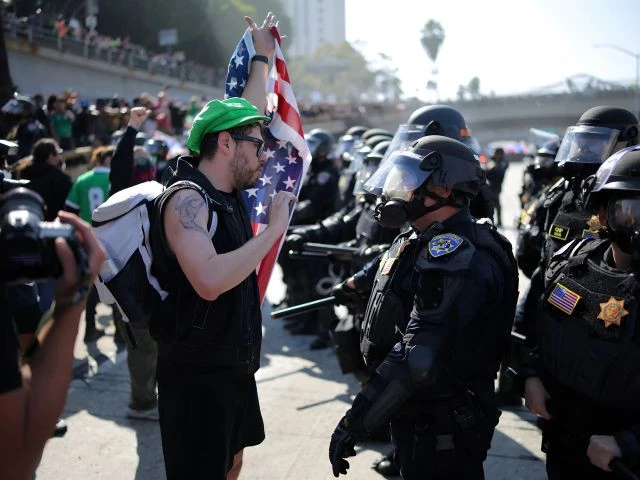photo police officers face off with demonstrators in downtown los angeles california u s june 8 2025 reuters photo police officers face off with demonstrators in downtown los angeles california u s june 8 2025 reuters