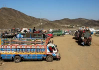 trucks transporting afghan nationals who were expelled from pakistan are parked as refugees wait for registration at the omari refugee camp in mohmand dara torkham border nangarhar province afghanistan april 15 2025 photo reuters