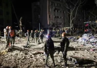 first responders inspect the site of an iranian missile strike in arad early on march 22 2026 photo afp