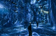 photo attendees interact with immersive visualizations at the museum of ai arts afp