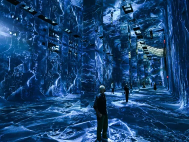 photo attendees interact with immersive visualizations at the museum of ai arts afp photo attendees interact with immersive visualizations at the museum of ai arts afp