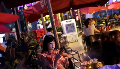 screengrab of customers dine at a restaurant in a shopping area of beijing china july 25 2022 reuters